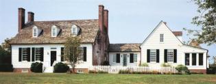 The addition doubled the size of a historic manor house while leaving its character intact.