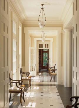 Sight lines from interior to exterior help relate the home to the surrounding farmland, while high ceilings and wide openings give it a graceful, stately air.
