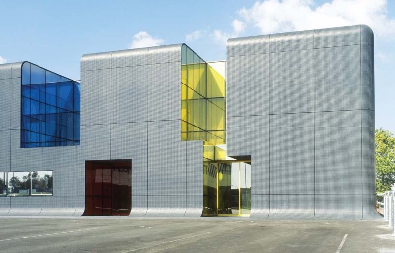 At the regional bus center in the southern Paris area of Thais, custom-molded panels made from fiber-reinforced Ductal concrete form an ultra-thin structural cladding system with a thickness of less than 1 1/4 inches.