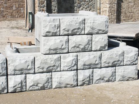 The Verti-Block retaining wall mold and concrete form system from Verti-Crete is small enough to install in a range of spaces but large enough to be installed quickly, the company says. Designed to create a stonelike texture, the form features a sliding tapered insert core that hollows out the block for lighter, easier transport. According to the company, filling the wall cavity with gravel assists with proper drainage, preventing the buildup of hydraulic pressure and strengthening the blocks' interlocking system. Each block has a 2' x 4' face and interlocks with a built-in setback of 5 percent to improve strength and maximize gravity-wall limits before requiring tiebacks.

verti-crete.com