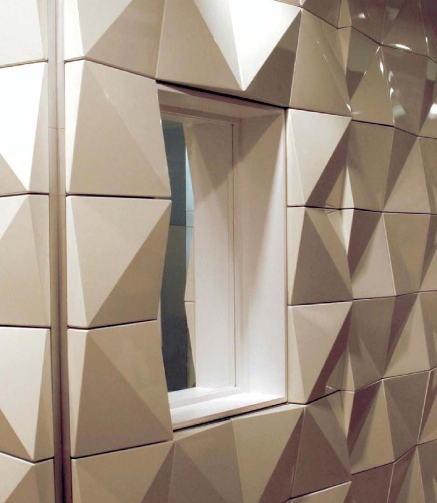 Graph modular interior wall systemFry Reglewww.fryreglet.com

Flexible aluminum grid system that adheres to existing wall systems - Prefabricated panels attach to the grid - Panels are available in a variety of metal finishes as well as four diff erent standard wood veneers - Designed in conjunction with Gensler