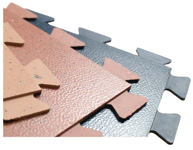 UnderLock flooring systemJohnsonitewww.johnsonite.com

Hidden locking tabs allow installation with no adhesive



Can be used temporarily or permanently



Can be used with Johnsonite's Triumph and Inertia flooring lines



Engineered for durability, flexibility, and performance in multifunctional facilities and sports-related environments



Available in 12 speckled colorways and 22 solid colors