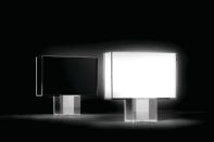 Tati, a new line of table lamps from Kartell, features a squared-off Art Decostyle shape. A transparent polycarbonate body encases an internal diffuser available in full-color methacrylate, opaline, and black or in pleated fabric. A chrome steel weight offers additional support. Its light intensity is fully adjustable. Tati is lamped with a 22W T5 ring and measures 47" wide by 46" tall by 15" deep. It was designed by Ferruccio Laviani. kartell.com