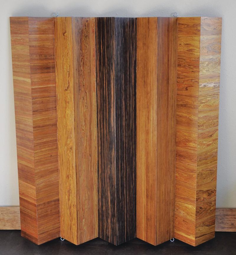 Made of 100% post-industrial byproduct wood, Songwood compressed wood composite panels from Engineered Timber Resources can be used for flooring, paneling, or other wood products. They are urea-formaldehyde-free, have low VOCs and life-cycle costs, and are refinishable. The panels are made of FSC-certified raw byproduct material from the furniture manufacturing and pulp industries, and are made by kiln-drying wood fibers with a low-VOC resin and then compressing them under 1,800 tons of pressure before curing them. They can be infused with organic dyes and colorants prior to compression and come in horizontal, vertical, and burl profiles. Topical stains are also available. ETimberr.com
