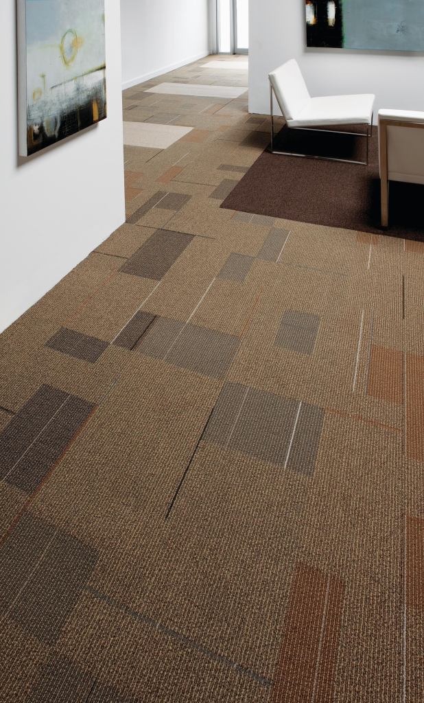 Tandus Floorings District, designed by Suzanne Tick, uses basic geometric forms influenced by the paintings of Piet Mondrian. Available as both a modular carpet and Powerbonda hybrid resilient sheet flooringDistrict comes in three patterns and 17 colors. Both are made with Antron Lumena solution-dyed type 6,6 nylon. Modular sizes include 18", 24", and 36" squares. Powerbond is installed in 6' by 100' sheets, and it has one of the lowest embodied energy ratings of any flooring. Available backings include ER3, made from recycled content, and ethos polymer, made from the film used in recycled safety glass and windshields. tandus.com