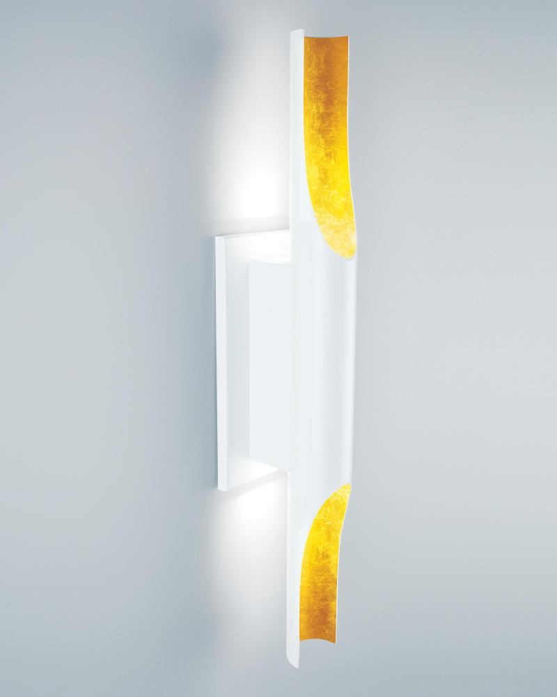The LED Halfpipe Sconce from Boyd Lighting is inspired by the French Art Deco movement. The 22" tall sconce is manufactured by radius cutting a cylinder to create a scallop shape, in which LED lamps wash light up and down a wall. Additional LED lamps are installed in the backplate. Halfpipes LED lamps have 45 lumens-per-watt efficiency, a 70,000-hour life, a 3,100 K color temperature, and consume 9.6W of energy. The luminaire comes in multiple finishes, including white on white and black and white with an optional white or yellow gold leaf. The sconce can be mounted vertically or horizontally. boydlighting.com