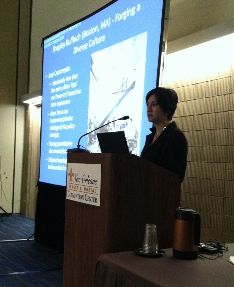 Maggy Godfroy, the human resources manager at Shepley Bulfinch, accepts the award on her firm's behalf.