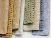 Trace and Courtship are reversible fabrics from Knoll Textiles that can be used as privacy curtains, drapes, or bedcovers. Courtship, a woven midweight drapery, features a raised vertical stripe created by a chenille Trevira yarn that adds multicolored texture. Six colors are available. Trace, available in seven colors, has an all-over small-scale weave with seven different colored yarns in the weft. ¢ www.knolltextiles.com