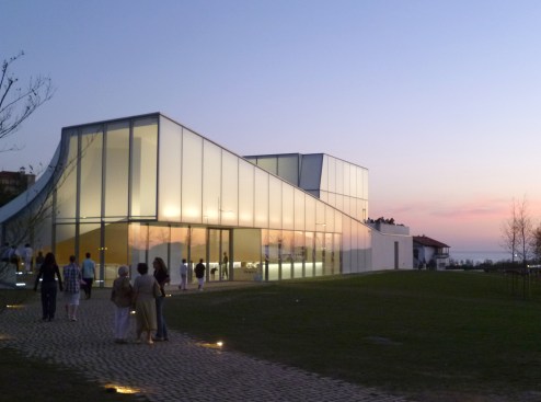 Visitors to the museum at dusk.