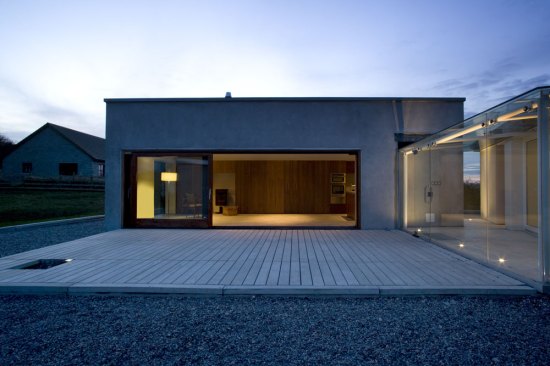 Large glazed elements allow for level access to new terrace area. Glazed link to right.