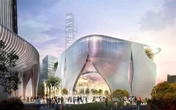Street level view of Xiqu Center in relation to piazza.