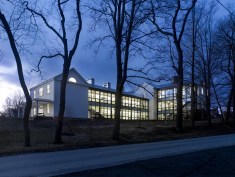 Curtainwall adds a contemporary, sustainable element to a decidedly traditional design