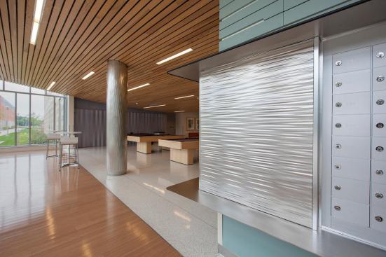 Wall panel and column in Stainless Steel with Sandstone finish and Kalahari Impression pattern at Salem State University, Salem, Massachusetts