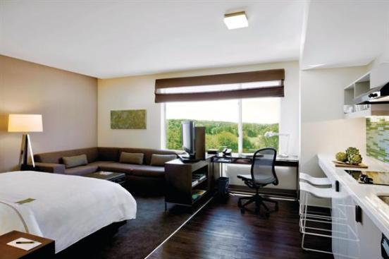Starwood?s Element brand serves as an eco-innovation lab for the rest of the company, piloting new technologies that are then applied to other brands. The Element Miami International Airport (shown) has recycling bins in guest rooms and public areas, soy-based fabrics, a daylight-harvesting system in public spaces, and energy-efficient LED exterior lighting, among other sustainable practices.