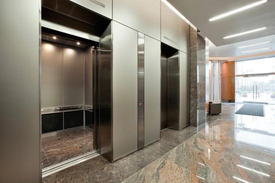 LEVELe Wall System with Blind panels in ViviChrome Chromis glass with custom color interlayer and Opalex finish at Mission City Corporate Center, San Diego, California