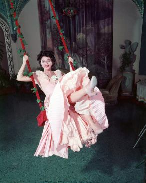 Joan Collins in the 1955 film, ''The Girl in the Red Velvet Swing.''
