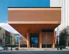 A lone column keeps silent sentry in the plaza of Charlotte, N.C.'s Bechtler Museum of Modern Art, which opened in January. Although the 47-foot-tall pillar is structurally necessary and part of the overall column grid, its girth is deceptive?a convex steel armature encloses the load-bearing concrete column within and supports a skin of terra-cotta tiles?and is meant to convey the building's massiveness.