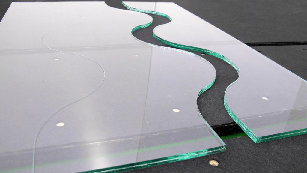 Complex geometric cuts are now achievable in safety glass.