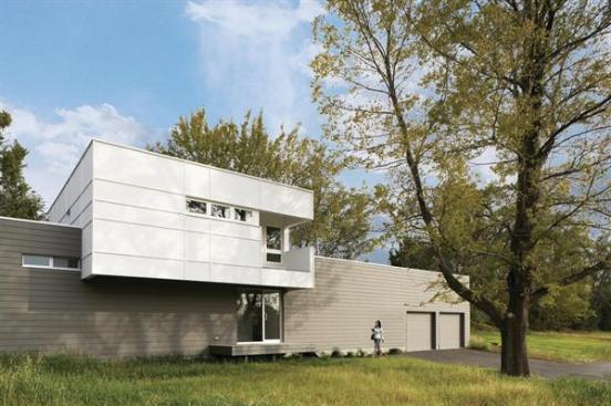 Architect Randy Brown positioned the windows on the home to frame views of nature but also to provide privacy from neighbors.