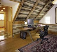 The 19th-century structure has been vaulted into the 21st century and beyond with high-tech wiring for the attic cum office and a whole-house audio system.