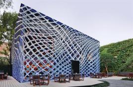 Designed+by+Rojkind+Arquitectos%2c+the+two+perforated+steel+templates+that+wrap+the+Tori+Tori+Restaurant+and+Lounge+give+the+flat+fa%c3%a7ade+a+three-dimensional+effect.
