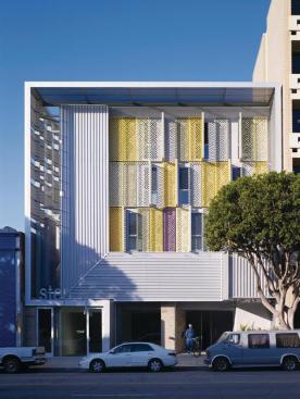 Water jet cut aluminum screens along the front of the project provide a passive cooling effect. 