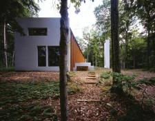 A freestanding fireplace is one of several events that foster an active engagement with the landscape.