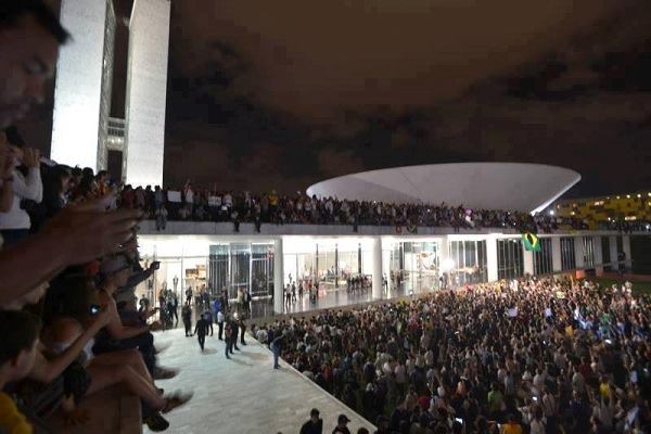 Protesters gather at the Brazilian National Congress building in Brasilia, Brazil, on Monday, June 17, 2013.