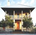 The home's stately facade gives way to an exuberant interior, filled with bright colors and surprising materials.
