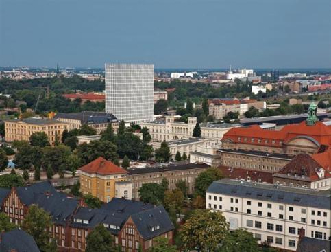 The+18-story+Tour+Total%e2%80%94which+towers+over+the+surrounding+historic+fabric+of+Berlin%e2%80%94is+the+first+completed+building+in+the+40-hectare+Europacity+master+plan+to+the+north+of+the+Hauptbahnhof%2c+the+city%e2%80%99s+main+train+station.