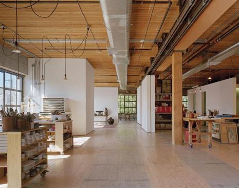 Four white walls pivot to control light and circulation
