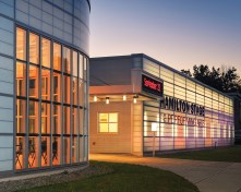 The exterior wall of the new addition is designed to glow at night, adding further excitement and drama to the theater experience.