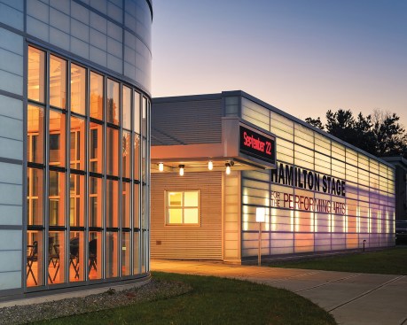 The exterior wall of the new addition is designed to glow at night, adding further excitement and drama to the theater experience.