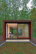 A green roof tops the below-grade section.