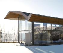 The copper roof is a mere 6 inches thick, but its folded-plate design allows long spans and eliminates the need for columns.