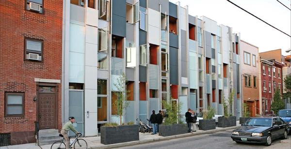 Skylights, glass floors, and efficient floor plans help these row homes live large.