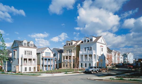 These detached townhouses grab outdoor space withprivate porches and a common green.