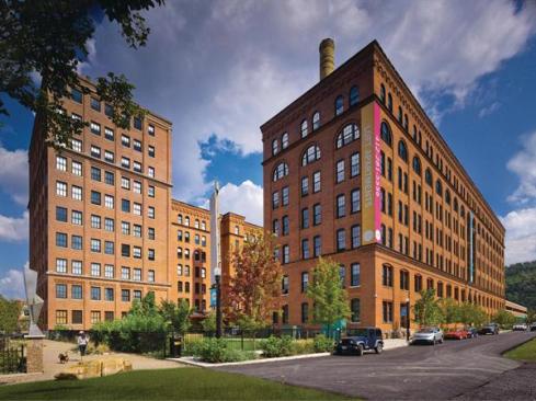 This old cork factory was redeveloped into a vibrant, mixed-use apartment complex with commercial, retail, and entertainment.