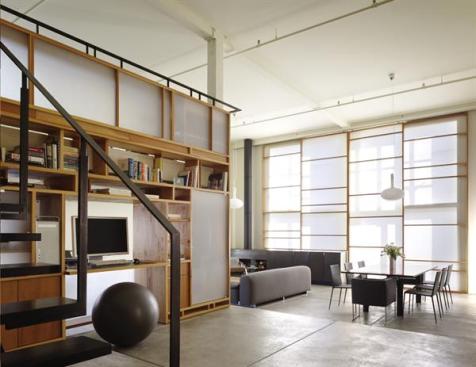 Most of the apartments pieces were made in the shop, reducing on site labor costs. These include the metal stair, the floor to ceiling fabric scrim lining the living room wall, and the translucent plastic panels that screen the loft bedroom upstairs.