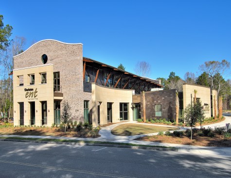 Street View. The structure is a combination of single story and two story masses, each in response to the functions within.   