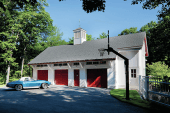 Remodeler Halsey Platt and his crew extended the eaves on the carriage house to keep water away from the siding. They also protected the lower section of the building by using Azek (azek.com) trim, a 1-inch by 3-inch cap, and white aluminum flashing that goes over the cap and up the side of the building. The carriage house has new vertical cedar siding installed over Benjamin Obdyke’s (benjaminobdyke.com) Cedar Breather underlayment, which remodeler Halsey Platt describes as a “plastic Brillo Pad-like” material that allows the wood to breathe.