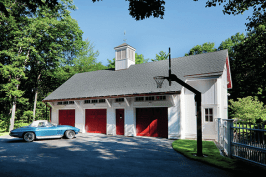 Remodeler Halsey Platt and his crew extended the eaves on the carriage house to keep water away from the siding. They also protected the lower section of the building by using Azek (azek.com) trim, a 1-inch by 3-inch cap, and white aluminum flashing that goes over the cap and up the side of the building. The carriage house has new vertical cedar siding installed over Benjamin Obdyke’s (benjaminobdyke.com) Cedar Breather underlayment, which remodeler Halsey Platt describes as a “plastic Brillo Pad-like” material that allows the wood to breathe.