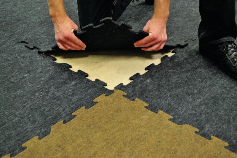 Ecore's Eco98 features a wear layer made entirely with recycled plastic bottles and a rubber backing that contains up to 98 percent recycled content.