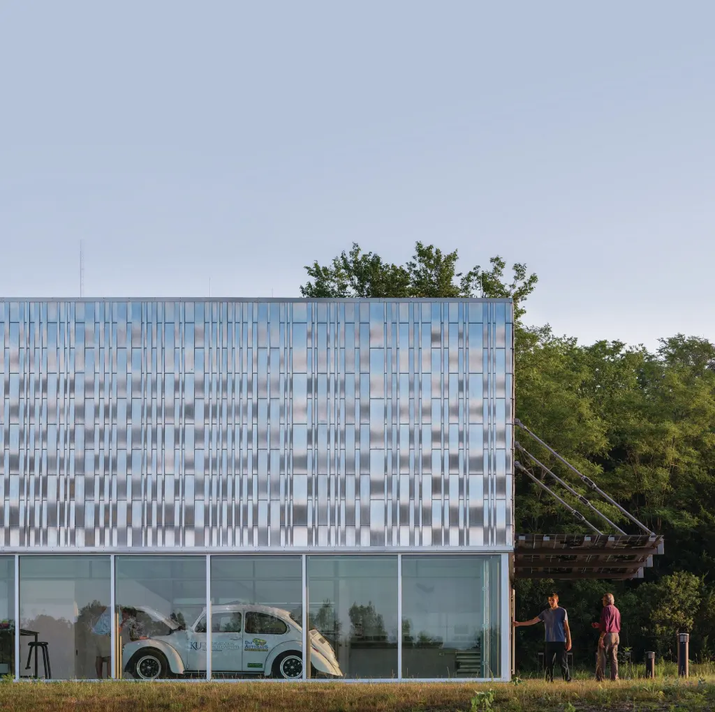 The main entrance to the EcoHawks facility is marked by a glass canopy with integrated photovoltaics from Suniva.