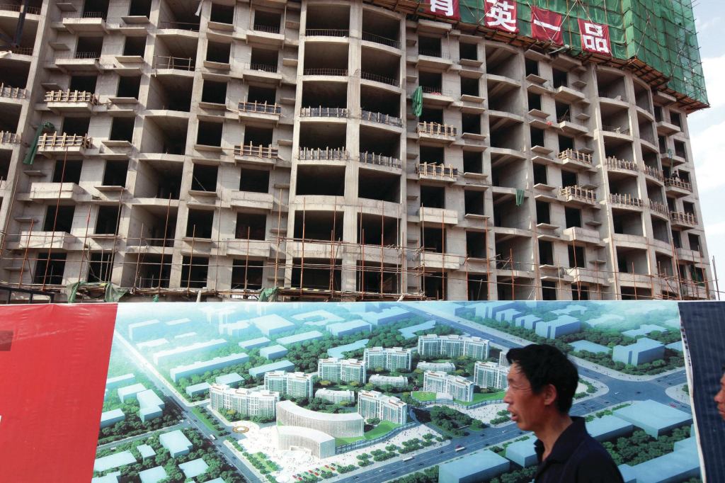 Apartment buildings under construction in the Kangbashi district of Ordos, one of China’s notorious ghost cities.