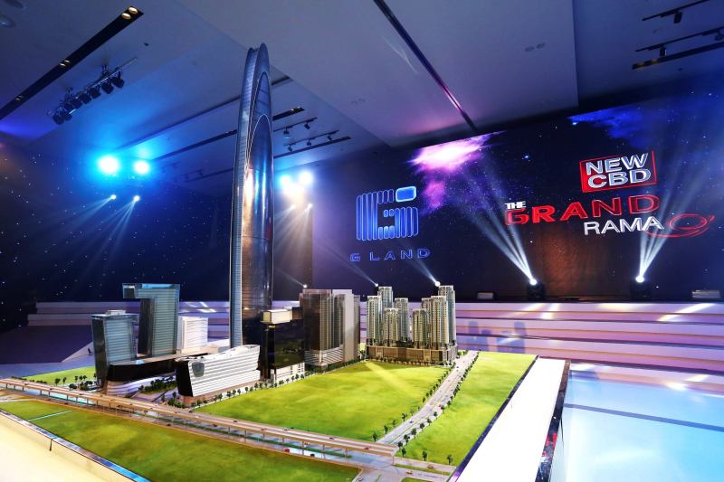 This photo released by Grand Canal Land Public Company Ltd. shows a scale model of a skyscraper that a property developer plans to build in Bangkok that will be among the 10 tallest buildings in the world when completed in 2019. The 125-floor tower will rise 615 meters (2,018 feet) and include a luxury hotel, offices, and an observation deck with panoramic views of the Thai capital, the developer said in a statement.