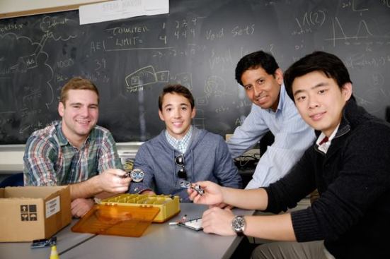 The Wake Forest University team of Jack Janes, Dominic Prado, computer science professor Paul Pauca, and Ran Chang display their Human Echo Location Partner device.