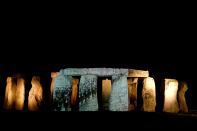 Video of World War I soldiers is projected on the rocks at the Stonehenge monument in England. The installation is part of a new exhibition opening Wednesday, "Soldiers at Stonehenge: Salisbury Plain and the journey to the First World War," that looks back at the site when it was military training grounds.