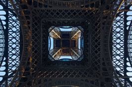 The renovation of the Eiffel Tower's first floor includes a glass floor along the inside perimeter, a feature that has become a crowd favorite.