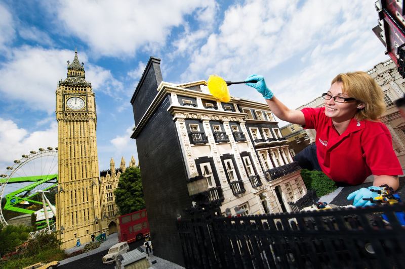 Model maker Katrina James dusts 10 Downing Street at Legoland Windsor Resort in England during the park's annual September cleaning.